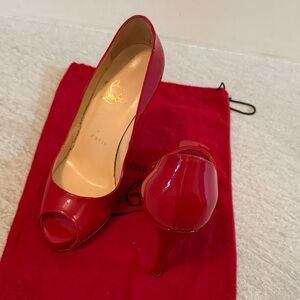 Christian Louboutin Bold Red Peep Toe Heels